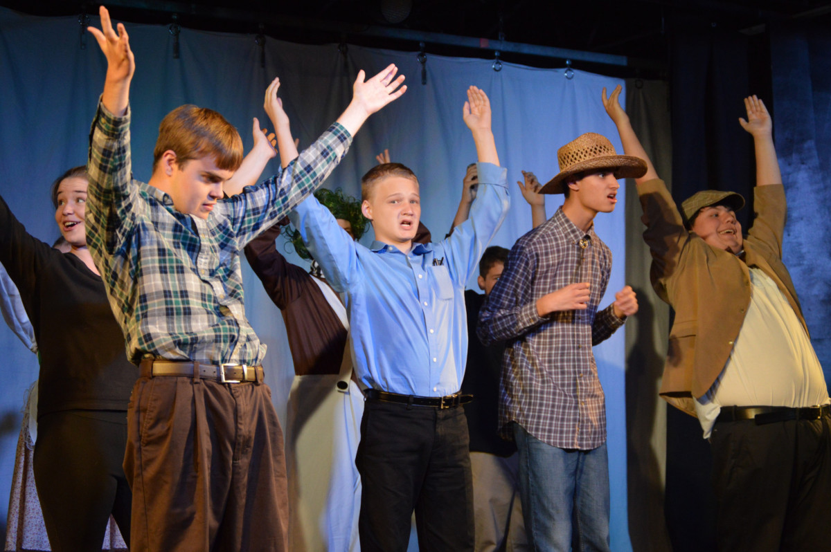 Four starcatchers special needs students performing on stage