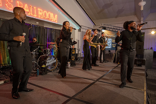 The Emerald City Band's Party Machine performs at Celebration of Champions