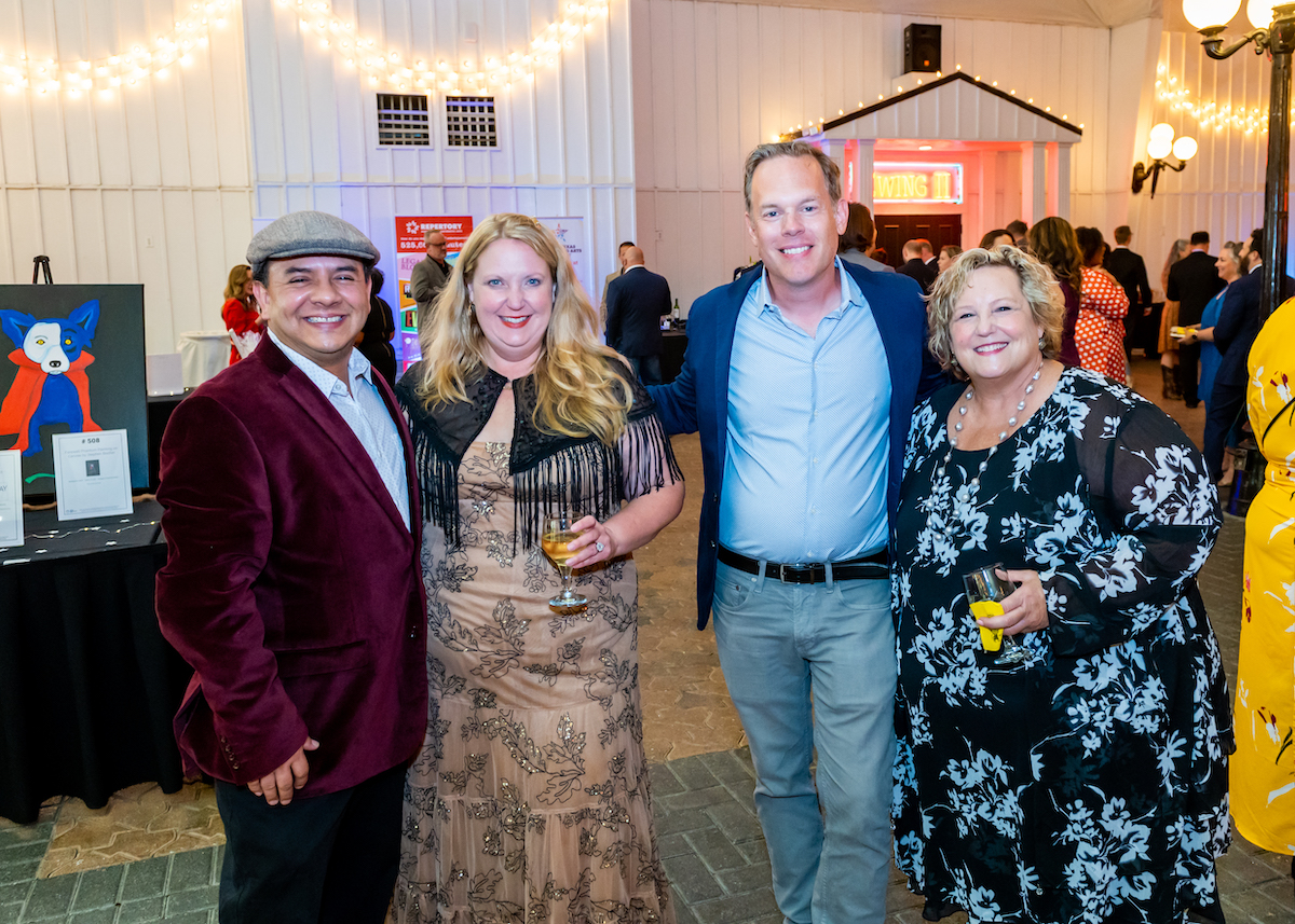 Sara Akers poses with guests at the 2022 Stardust Awards