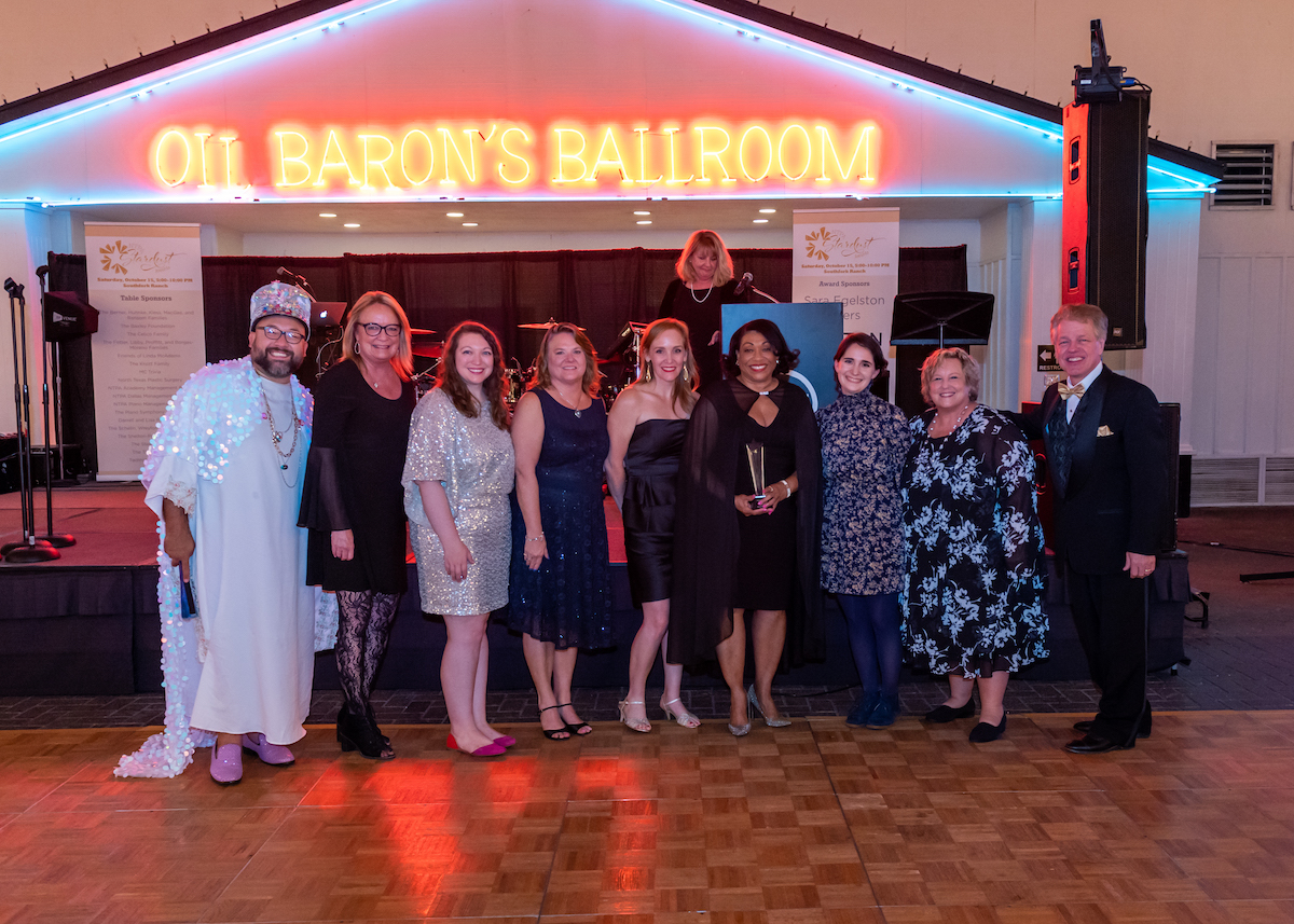 Zenetta S Drew accepts award at NTPA Stardust Awards Ceremony